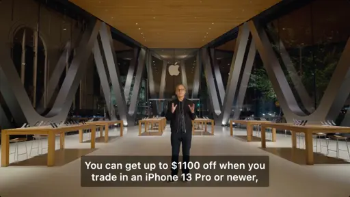 A man in September 09 Apple Keynote saying “You can get up to $1100 off when you trade in an iPhone 13 Pro or newer, in any condition”